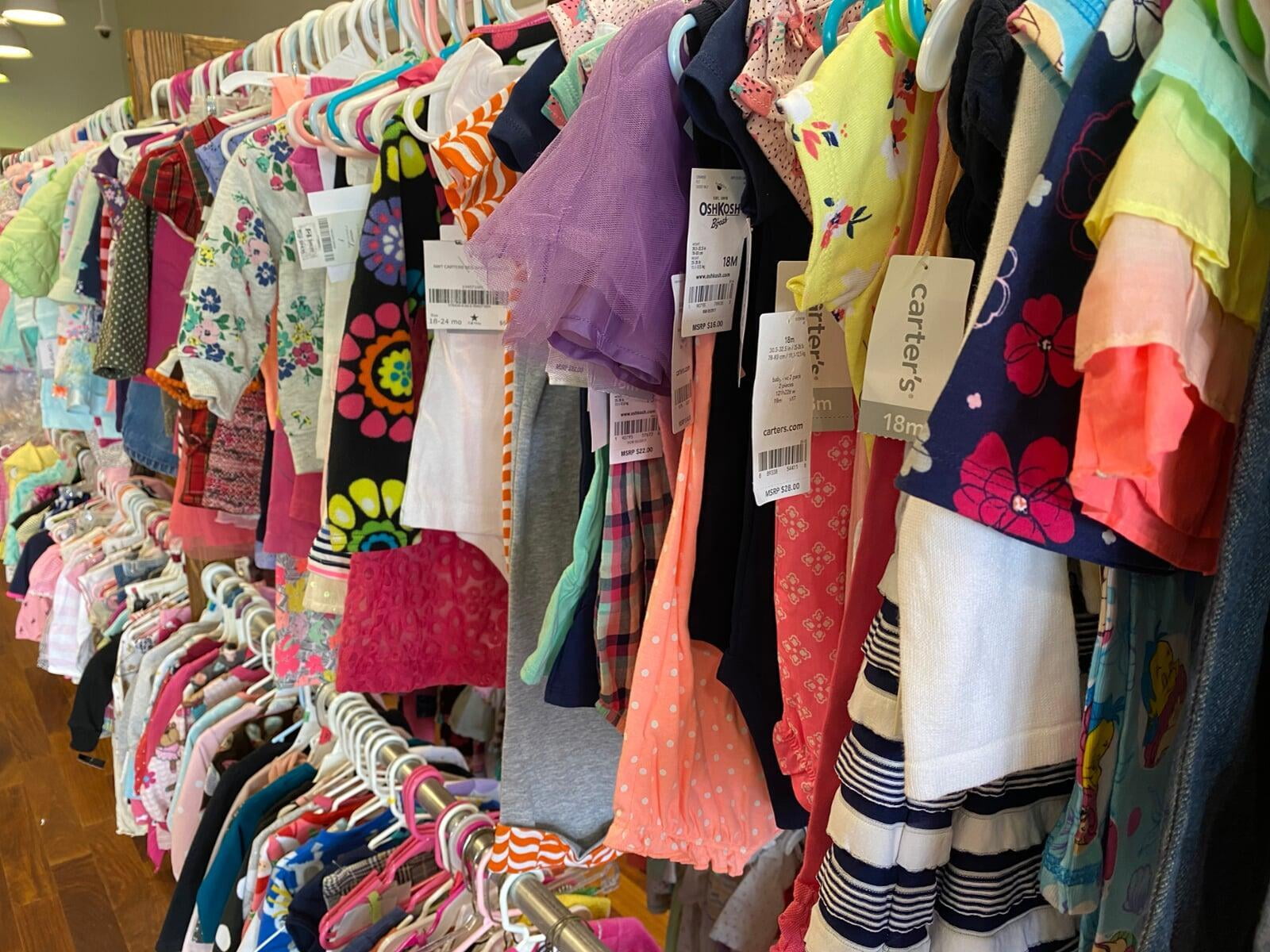 hanging rack of children's clothing